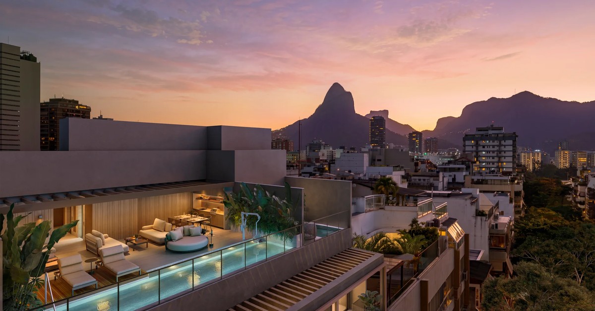 Perspectiva do rooftop do projeto ao pôr do sol